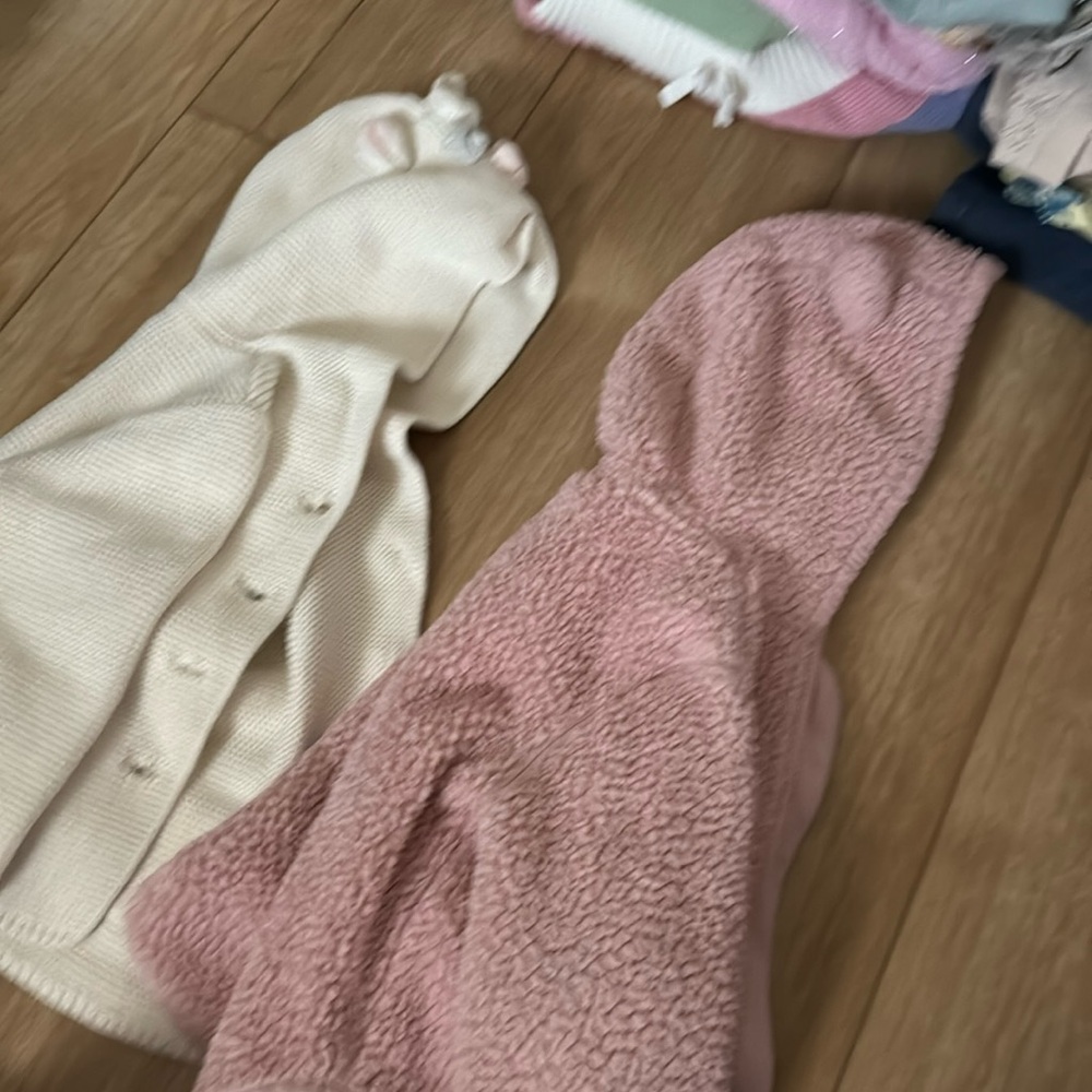Two light sweaters one teddy bear from old navy the other unicorn from gap